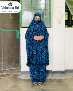 * Woman wearing premium blue linen khimar set* Stylish modest Islamic wear for women
* Soft ready-to-wear khimar with plazo
* Elegant blue printed khimar outfit
* Comfortable prayer khimar set for daily use
* Premium modest fashion by Veltrona BD
* Lightweight linen khimar for Hajj and Umrah
* Full coverage Islamic dress for women